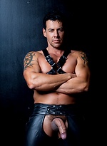 Muscle man in leather pants. by Colt Studio