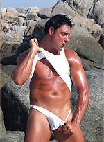 Stud Marcello at the beach wearing a white thong and playing with his cock by With Marcello With Marcello