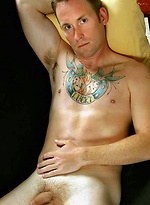 Tattooed hunk Chris posing naked by PerfectGuyz