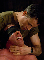 Three doms use and abuse Derek Pain during a live shoot. by Bound Gods