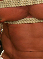 Three doms use and abuse Derek Pain during a live shoot. by Bound Gods