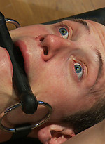 A sexy stud endures a brutal bondage workout including flogging, electro, and a hard suspension fuck from a sadistic trainer with an enormous cock. by Bound Gods