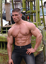 Antonio posing outdoors by Muscle Gallery
