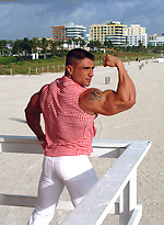 Antonio posing outdoors by Muscle Gallery