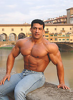 Tarek posing outdoors by Muscle Gallery