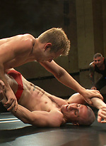 A bodybuilder and a hot stud fight for total domination. Winner will celebrate with a victory fuck... loser will have his hole pounded in humiliation. by Naked Kombat