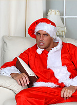 Santa Marcello is dressed in a cheeky outfit and playing with his huge cock by With Marcello With Marcello