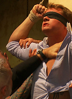 A stud endures brutal face and ass fucking by a crowd of strangers while suspended upside down. by Bound in Public