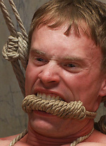 A sexy stud ends up being manhandled, bound, suspended and gang fucked, when he goes to a public restroom to service the horny men cruising there. by Bound in Public