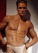 Muscle man posing naked by Colt Studio
