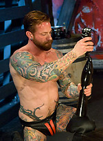 Red Nanky. Tattooed guys in gay fisting scene. by Hot House Backroom