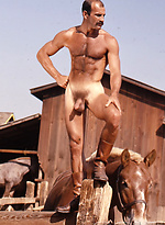 Hot muscle men Mike Morris posing naked by Colt Studio