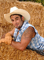 Young sexy cowboy outdoors by Samuel O Toole