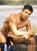 Brunette hunk Arthur Gordon naked outdoors by Colt Studio