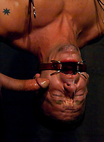 Muscular stud Adam Knox gets tied up, waxed, flogged and fucked by Nick Moretti in Slick it Up gear. by Bound Gods With Nick Moretti,Adam Knox