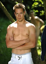 Cute boy posing naked outdoors by William Higgins