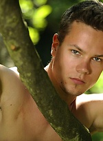 Cute boy posing naked outdoors by William Higgins