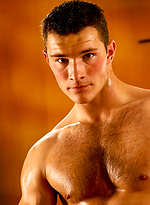 Muscle man shows his perfect hairy ches and uncut boner by William Higgins