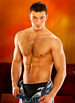 Muscle man shows his perfect hairy ches and uncut boner by William Higgins
