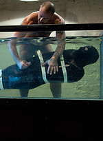 Dante is bound in the sleepsack and made to cum underwater by CJ Madison. by Bound Gods With CJ Madison