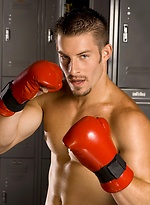 Mike Roberts posing in a locker room by Hot House Backroom With Mike Roberts