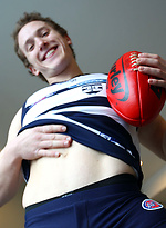 Footy Fan Brad Thomas Getting Off before the Game by Bentley Race