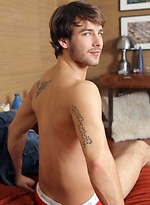 Kurt Madison shows off haunting green eyes, a handsome scruffy face and a cock so big it would make any bottom quiver with anticipation. by Randy Blue