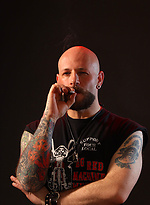 Tattooed Biker Smoking - Mike Chain by Butch Dixon