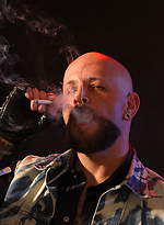 Tattooed Biker Smoking - Mike Chain by Butch Dixon