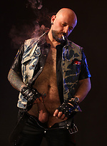 Tattooed Biker Smoking - Mike Chain by Butch Dixon