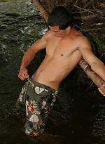 Young sexy jock posing naked outdoors by East Boys