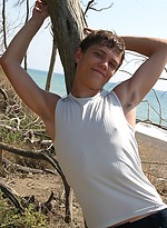 Cute twinks on a beach by East Boys