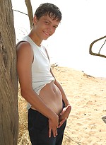 Cute twinks on a beach by East Boys