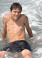 Cute twinks on a beach by East Boys