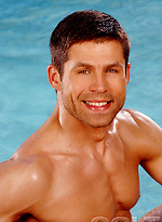 Hot muscle hunk posing by the pool by Colt Studio