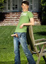 Cute twink posing on a lawn by Colt Studio