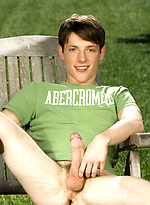 Cute twink posing on a lawn by Colt Studio