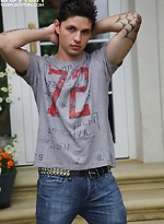 Tattooed stud Jeremy stroking his cock outdoors. by BF Collection