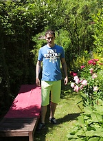 Tattooed Peter Jules masturbating outside in the yard. by BF Collection