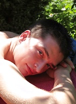 Tattooed Peter Jules masturbating outside in the yard. by BF Collection
