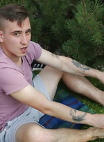 Joshua Czech lays a blanket down outside and busts a nut. by BF Collection