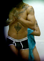 Great looking guy dressing after a shower by Sneaky Peek
