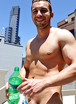 James Nowak strips out of his rugby gear on the roof by Bentley Race