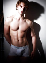 Gabriel posing in studio by Male Model