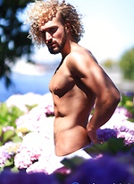 Erik blond muscular hunk garden shoot by Male Model