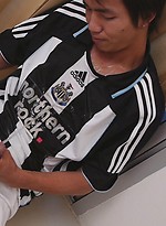 Watersports loving twinks soak each other while still wearing their favorite football kits. by Gay Asian Piss