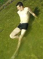 Young Boy Plays In Water by EU Twinks