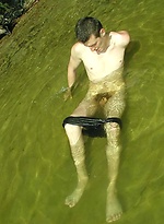 Young Boy Plays In Water by EU Twinks