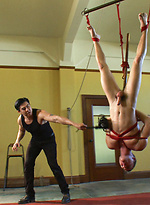 A straight stud gets tied up, suspended and have his hole stretched with the dildo. by Men On Edge