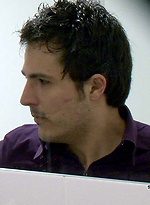 The pervy cameraman at Sneakypeek catches a hunky workman coming into the bus station toilet to have a crap. by Sneaky Peek